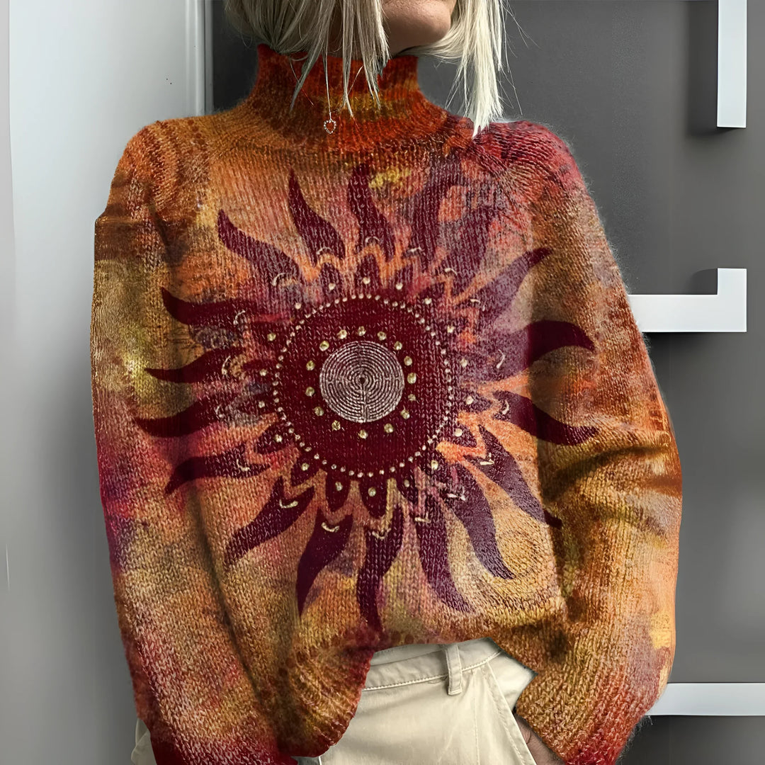 Elsie | Warm knitted turtleneck sweater with tribal sun motif